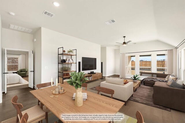 living room featuring ceiling fan, lofted ceiling, and light hardwood / wood-style flooring