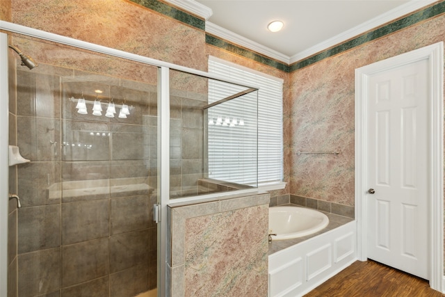 bathroom with independent shower and bath, ornamental molding, and hardwood / wood-style floors