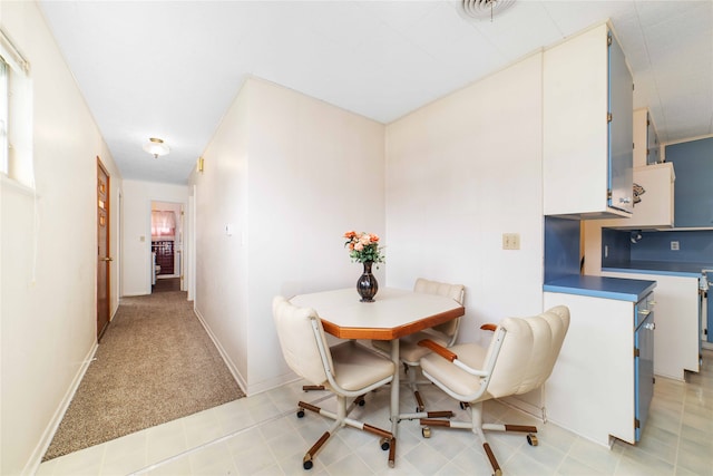 view of carpeted dining room