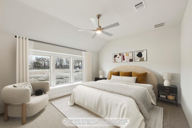 bedroom featuring ceiling fan, light colored carpet, and lofted ceiling