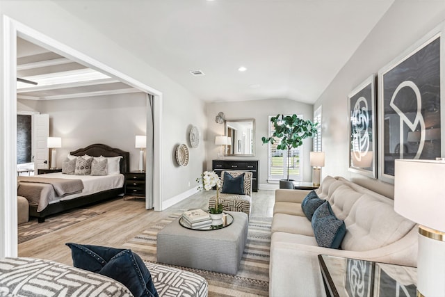 bedroom with visible vents, baseboards, recessed lighting, vaulted ceiling, and wood finished floors