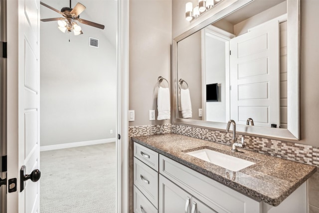 bathroom featuring visible vents, ceiling fan, and vanity