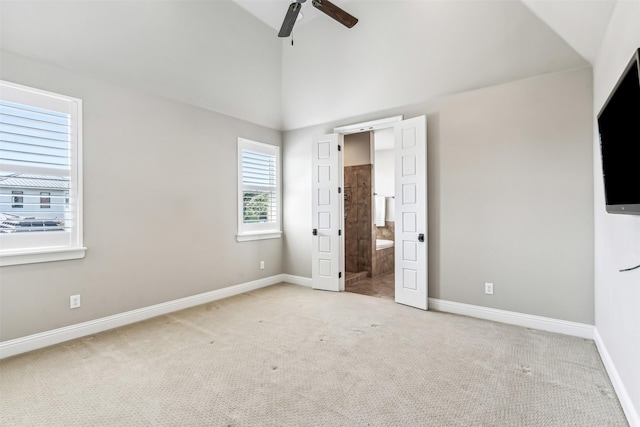 unfurnished bedroom featuring carpet flooring and baseboards