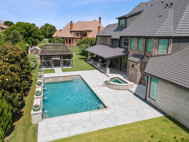 view of swimming pool with a gazebo, a yard, an in ground hot tub, and a patio area