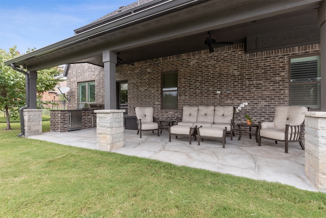 view of patio with a grill and exterior kitchen