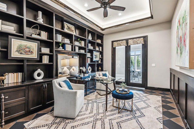 office area with recessed lighting, a ceiling fan, a raised ceiling, and baseboards