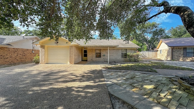 single story home with a garage