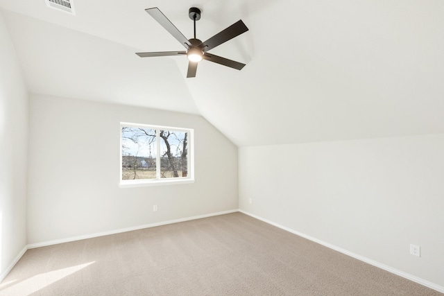 bonus room featuring ceiling fan, carpet, and lofted ceiling