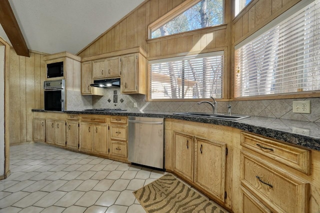 kitchen featuring sink, decorative backsplash, lofted ceiling with beams, and stainless steel appliances