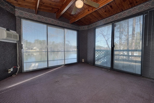 interior space with a healthy amount of sunlight, vaulted ceiling with beams, and wood ceiling