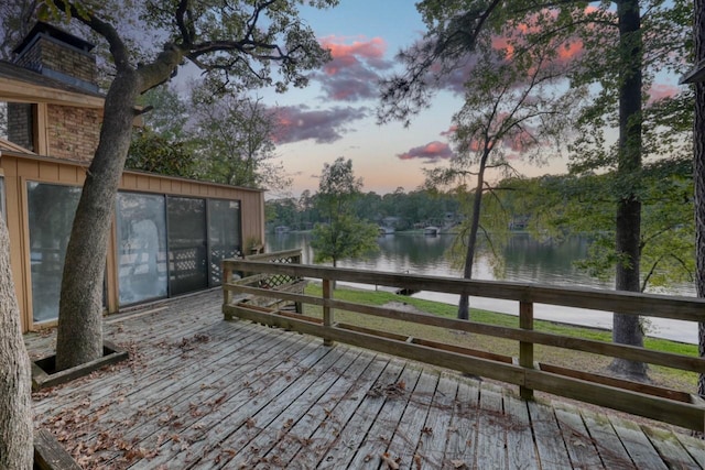 deck at dusk with a water view