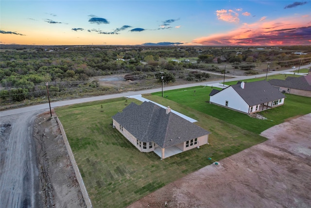 view of aerial view at dusk