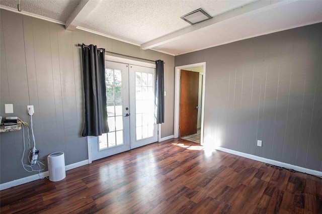 spare room featuring ceiling fan, a textured ceiling, and wood-type flooring