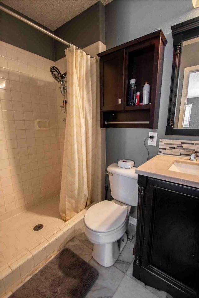 spare room with a textured ceiling and dark hardwood / wood-style flooring