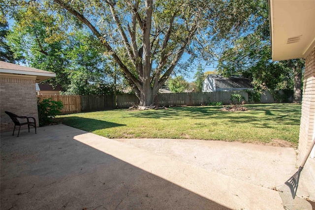 view of yard with a patio area