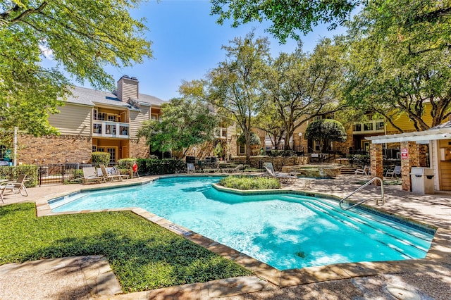 view of pool featuring a patio