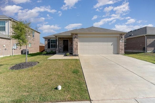 view of front of home featuring central AC unit, a garage, and a front lawn