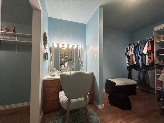 bathroom with vanity and wood-type flooring