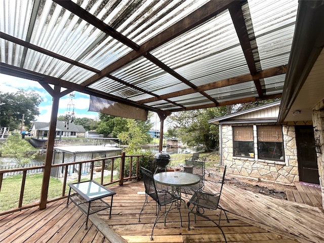 deck featuring a water view