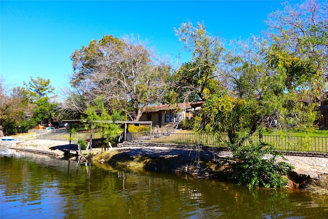 exterior space with a water view