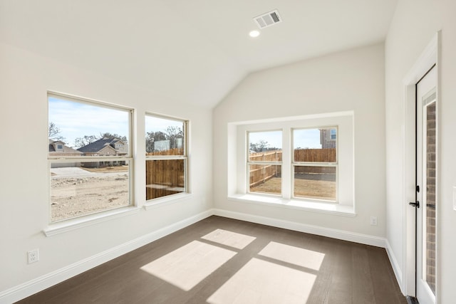 unfurnished sunroom with lofted ceiling