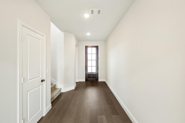 doorway with dark hardwood / wood-style flooring