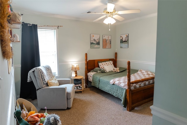 bedroom with ceiling fan, carpet, and crown molding