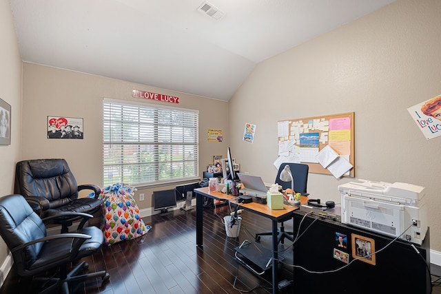 home office featuring vaulted ceiling and dark hardwood / wood-style floors