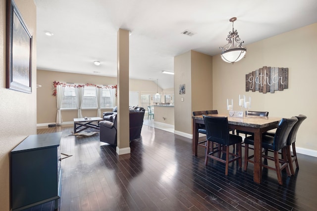 dining area featuring dark hardwood / wood-style flooring