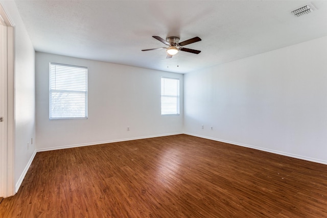 spare room with ceiling fan, wood-type flooring, and a textured ceiling