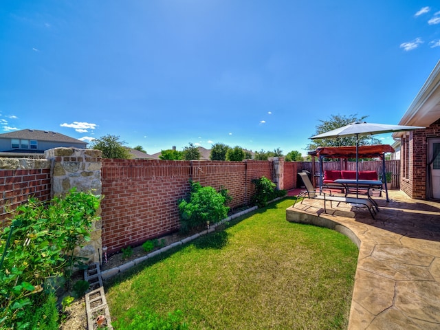 view of yard with a gazebo and a patio area