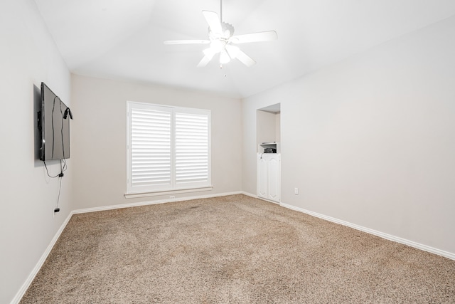 empty room with carpet flooring and ceiling fan