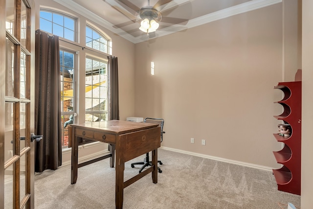 home office with crown molding, ceiling fan, and light colored carpet