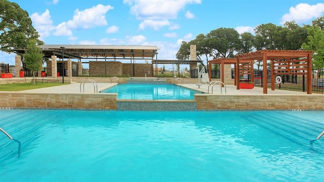 view of swimming pool featuring a pergola, a patio, and pool water feature