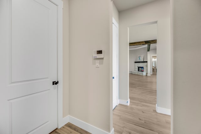 corridor featuring light hardwood / wood-style floors