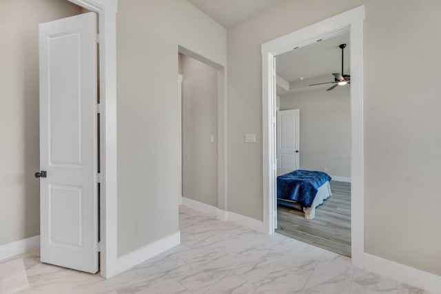 hall with light wood-type flooring