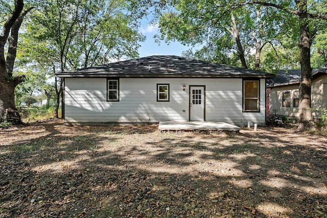 back of property featuring a patio area