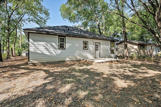 back of house featuring a patio area