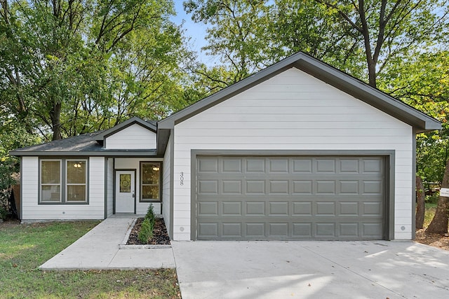 view of front of home with a garage