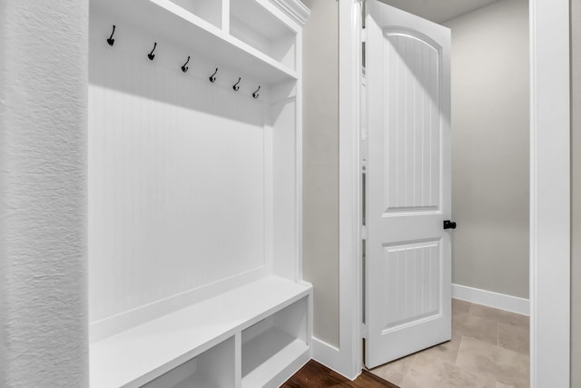 mudroom featuring light tile patterned floors