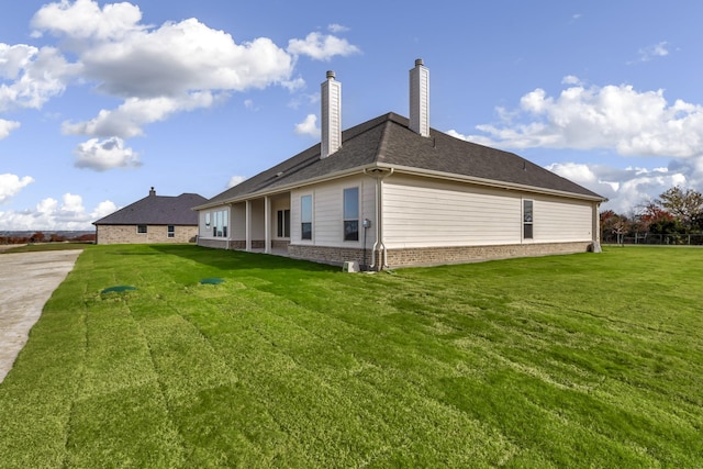 view of property exterior featuring a yard