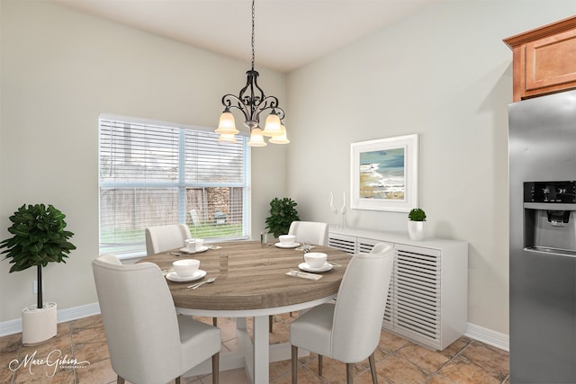 dining area featuring an inviting chandelier