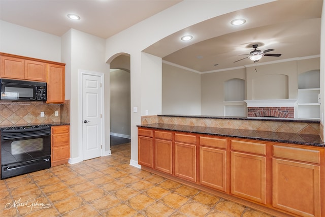 kitchen with dark stone counters, decorative backsplash, ceiling fan, and black appliances