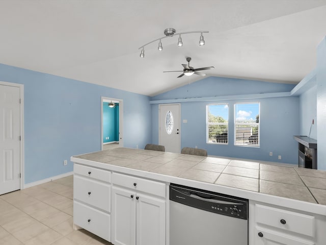 kitchen with tile countertops, dishwasher, ceiling fan, and white cabinetry