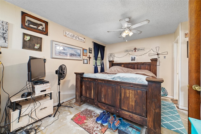 bedroom featuring a textured ceiling and ceiling fan