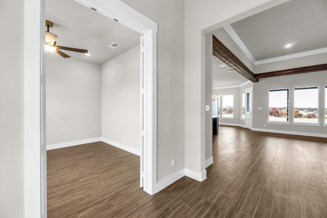 hallway with dark hardwood / wood-style floors, ornamental molding, and a chandelier