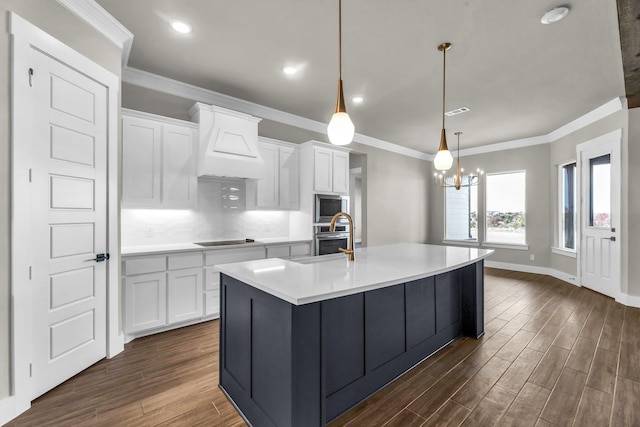 kitchen featuring premium range hood, white cabinetry, stainless steel appliances, and dark hardwood / wood-style floors