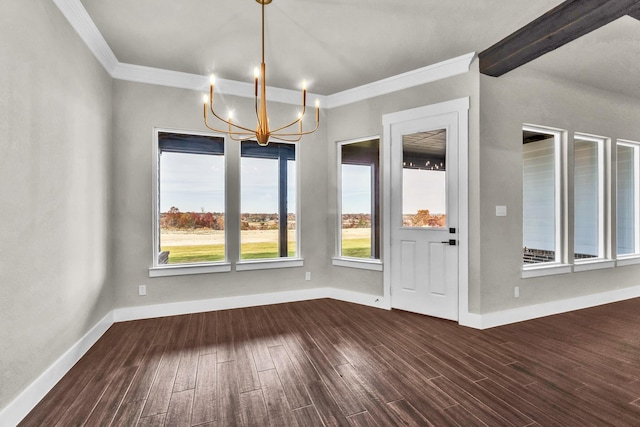 unfurnished dining area featuring ornamental molding, an inviting chandelier, and dark wood-type flooring