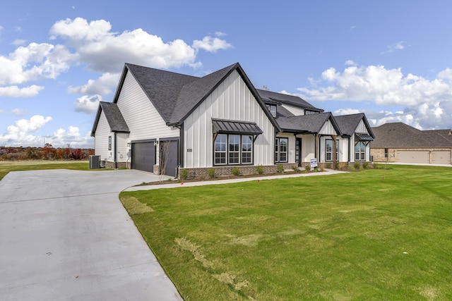 modern farmhouse with cooling unit and a front lawn