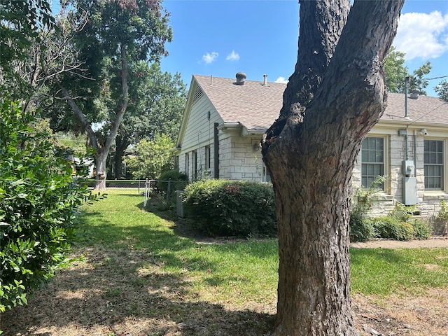 view of property exterior featuring a yard